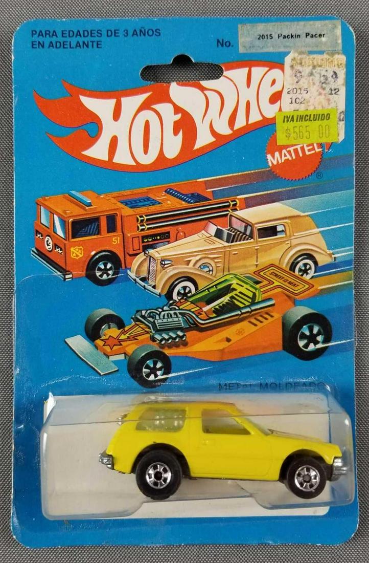 Hot Wheels Mexican market Packin Pacer 2015: Die cast vehicle in original packaging. Made in Mexico, 1977 Mattel, Yellow Body with 427 and Arrow Decals