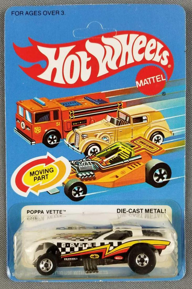 Hot Wheels Moving Part Poppa Vette 2528: Die cast vehicle in original packaging, made in Malaysia, 1977 Mattel, Unpunched, White Body with Corvette, Cragar, Pennzoil, and Bell Decals