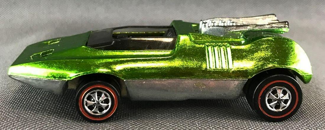 Hot Wheels Redline Peeping Bomb die-cast vehicle: 1969 Mattel, Inc. Apple Green Body Color, Near Mint to Mint condition with only one scuff/toning issue on the back passenger wheel hub. Black interior