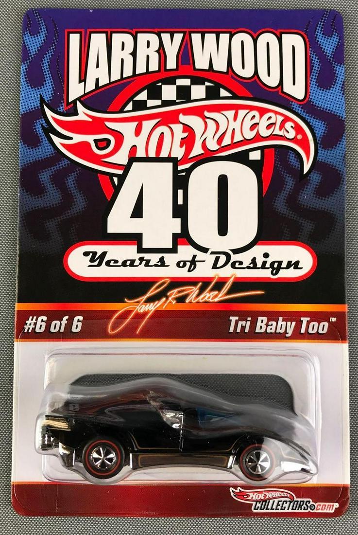 Hot Wheels Larry Wood Tri Baby Too: 40 years of design. 06895/03500, 6/6, die cast, new in original packaging.