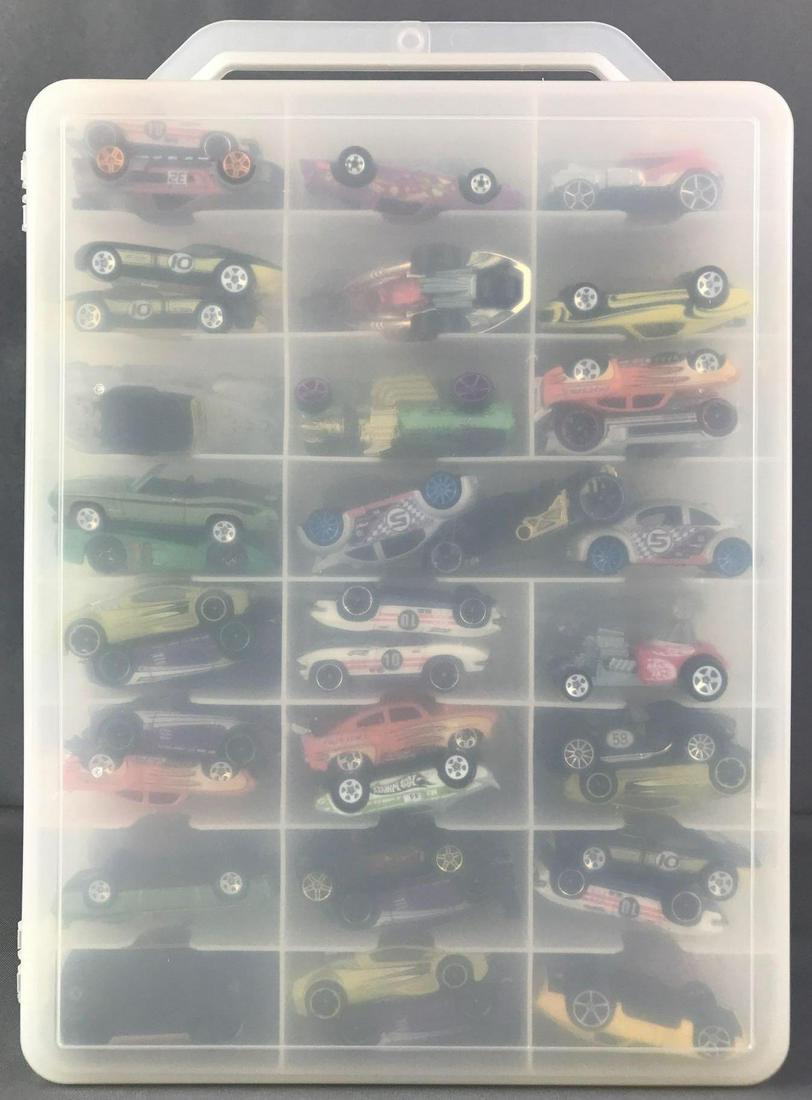 Group of Hot Wheels Die Cast Vehicles in Case: Includes approximately 79 Vehicles.