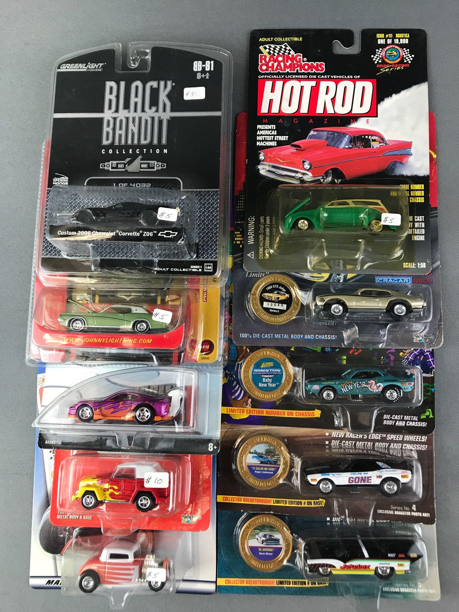 Group of 10 Hot Wheels Die Cast Vehicles: Includes Boxotica, Custom 2006 Chevrolet Corvette Z06, Super Tsunami, and more. New in original packaging.