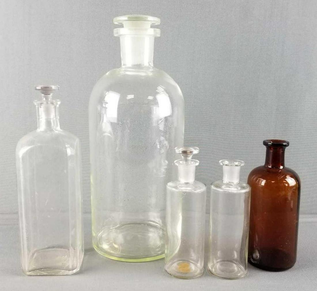 Group of glass apothecary/specimen jars: Largest is 14 inches tall