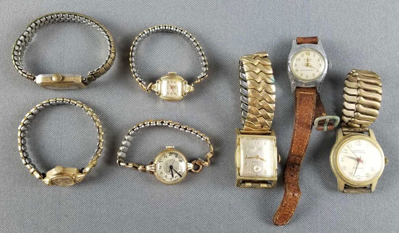 Group of vintage wristwatches: Gruen, Orvin, Bulova, and more. Need repair
