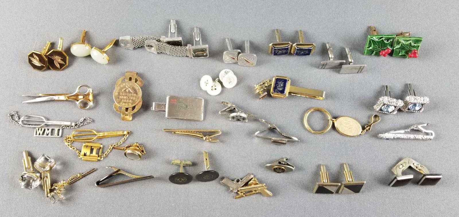 Group of cufflinks, tie clips and more (1 of 3)