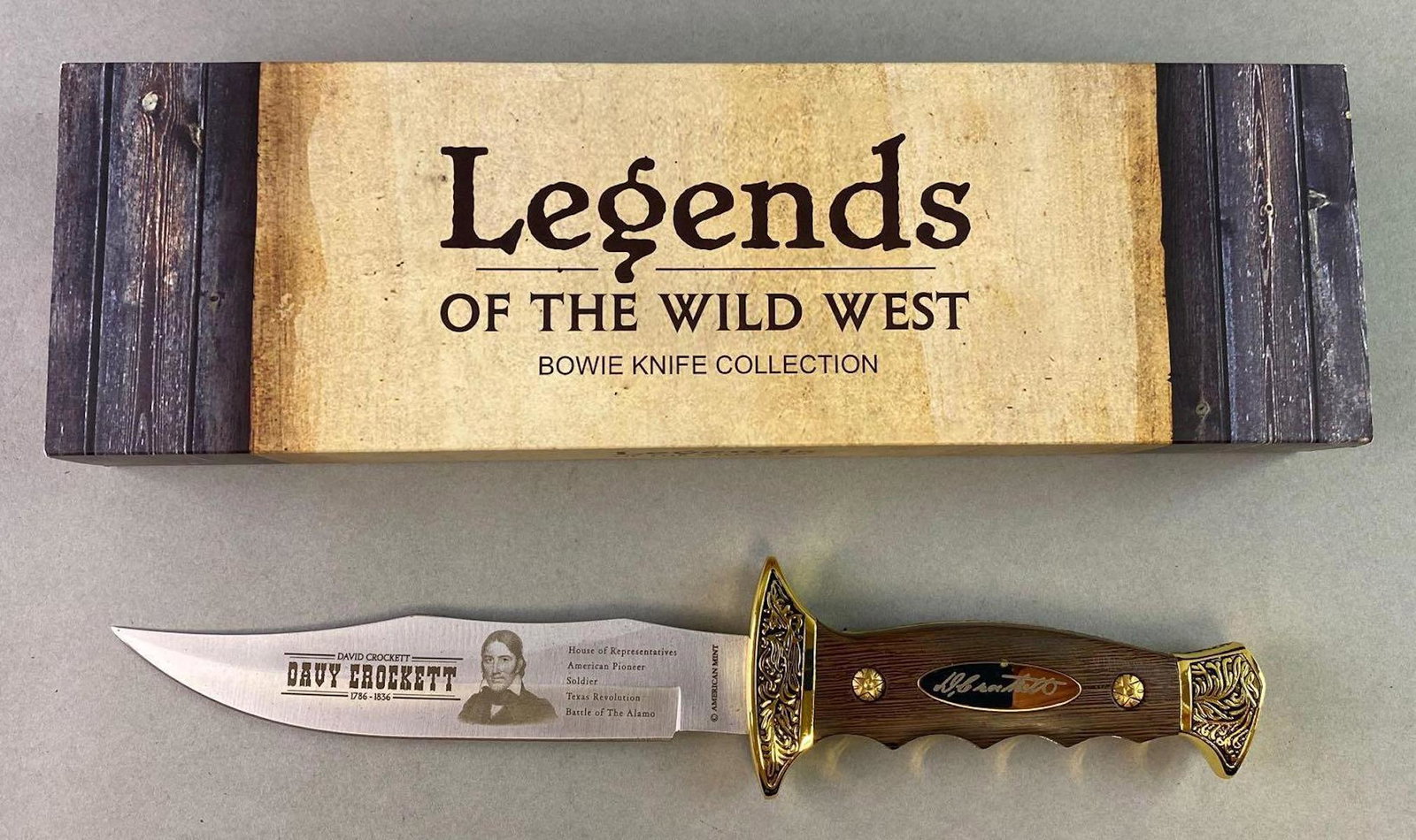 Legends of the Wild West Daveâ€™s Crocket Bowie Knife: Limited edition. Measures 11 1/4 inches long. New in box with certificate of authenticity. Made by American Mint