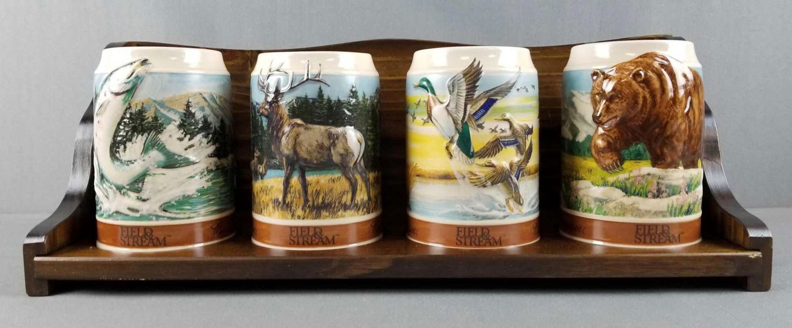 Budweiser Field & Stream steins on display shelf (1 of 5)