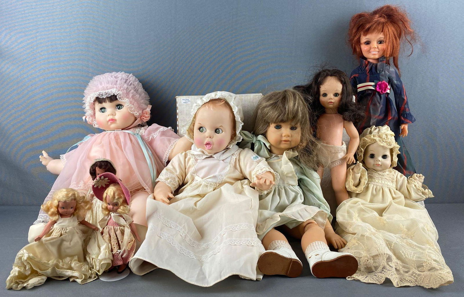 11 piece group of assorted dolls (1 of 6)