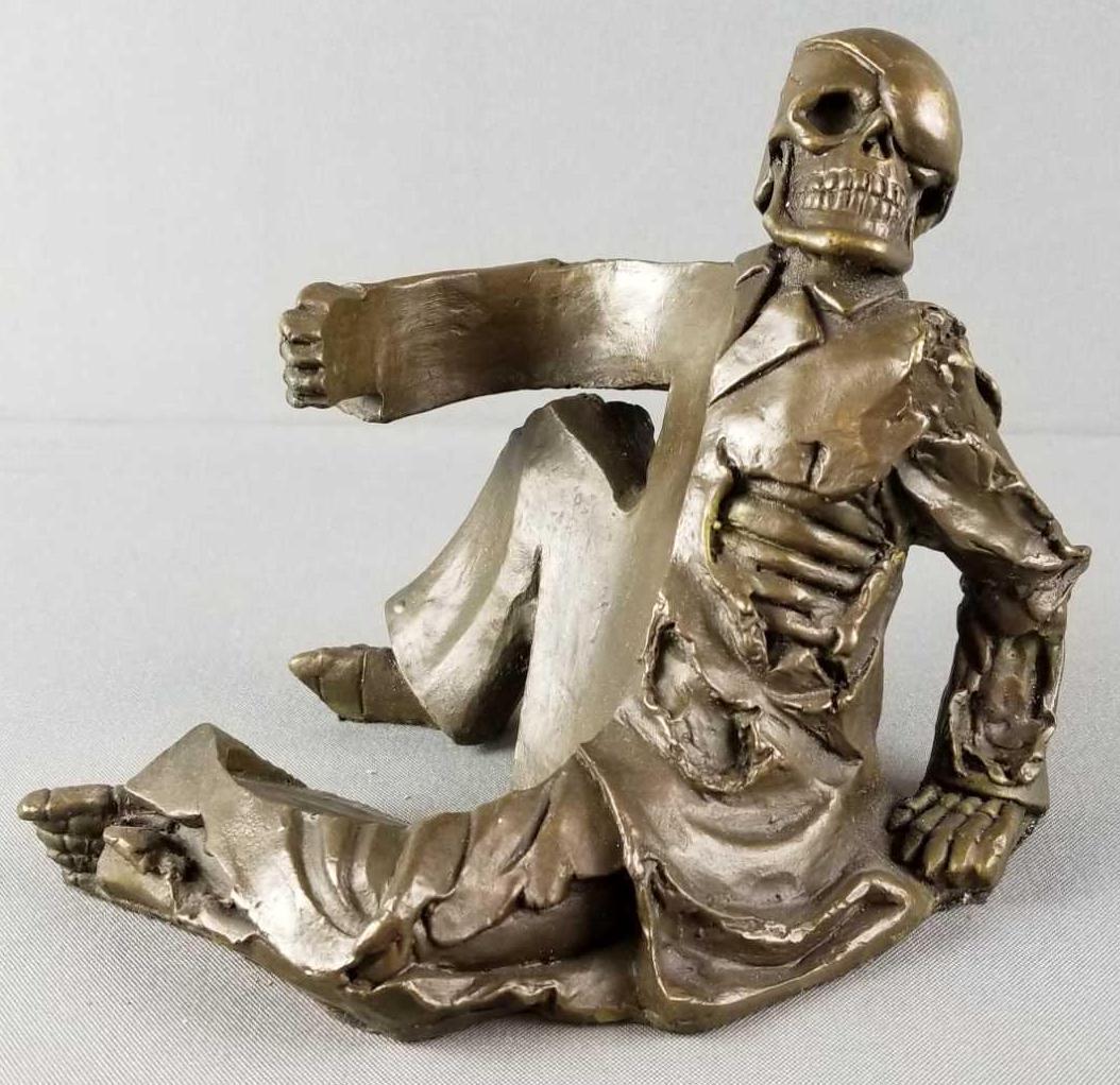 Milo Brass skeleton wine bottle holder: Skeleton pirate, 6 inches tall. Signed Milo. This is a modern item, not antique or vintage