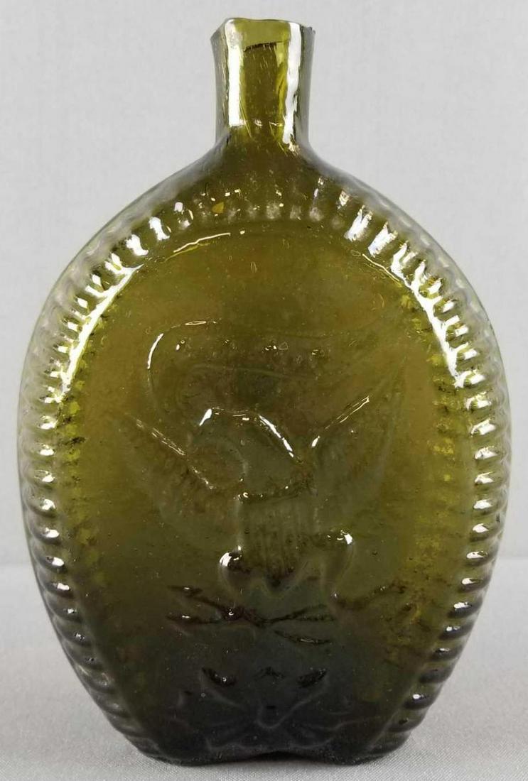 Historical Flask Double Eagle Olive: Open pontil, top lip is smoothed. 8.5 inches tall