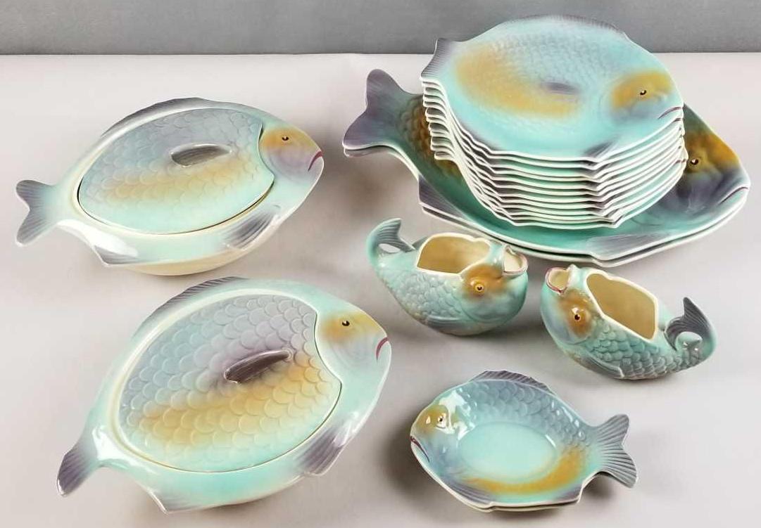 Double fish 20 piece dish set: Designed by Clarice Cliff for Shorter England. Covered dishes, plates. Broken tail on covered dish. Crazing throughout