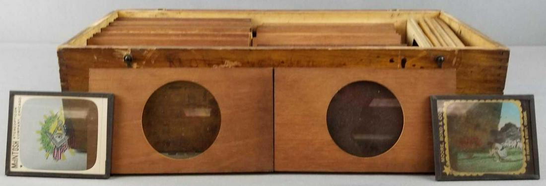 Antique Masonic Magic Lantern glass slides: Includes wood case. Slides with wood measure 7 x 4 inches. One is cracked.