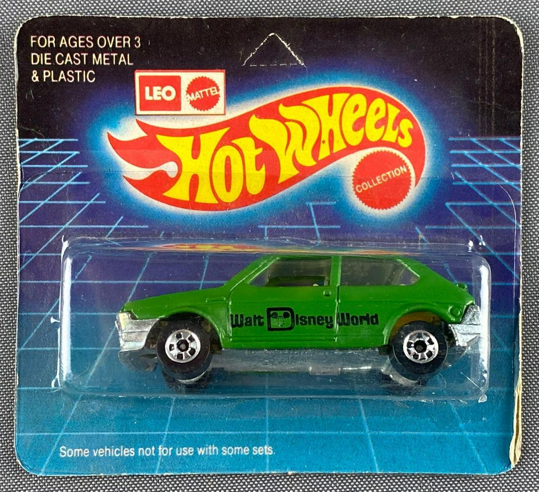 Leo Mattel Hot Wheels No. 3287 Fiat Rismo: Die-cast vehicle, new in original packaging, unpunched card, green body color, Walt Disney World decals. 1982 Mattel Toys (India) Ltd.