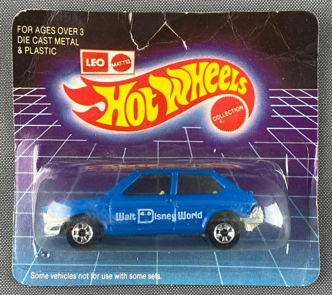 Leo Mattel Hot Wheels No. 3287 Fiat: Die-cast vehicle, new in original packaging, unpunched card, blue body color, Walt Disney World decals. 1982 Mattel Toys (India) Ltd.