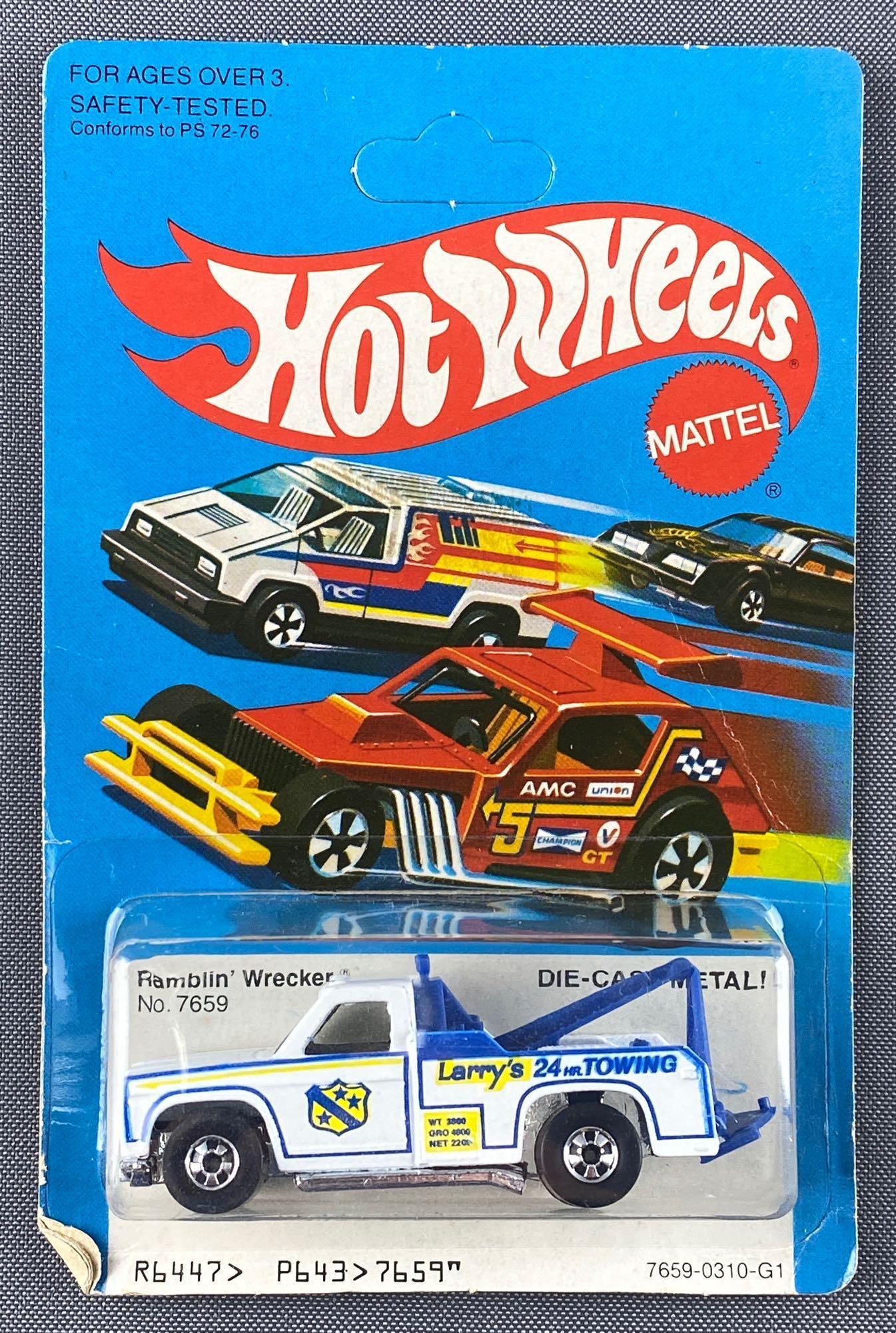 Hot Wheels No. 7659 Rambling Wrecker: Die-cast vehicle, new in original packaging, unpunched card, white body color. 1974 Mattel, Inc. Made in Hong Kong