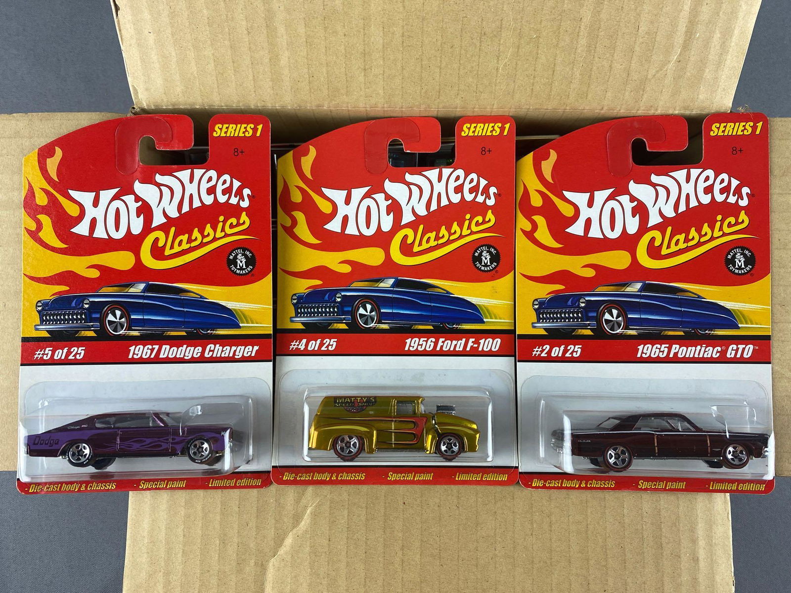 Full shipping box of Hot Wheels Classics die-cast: Series 1, includes 2956 Ford F-100, 1970 Dodge Dart, 1957 Chevy Bel Air, and more. New in original packaging. 2004 Mattel, Inc.