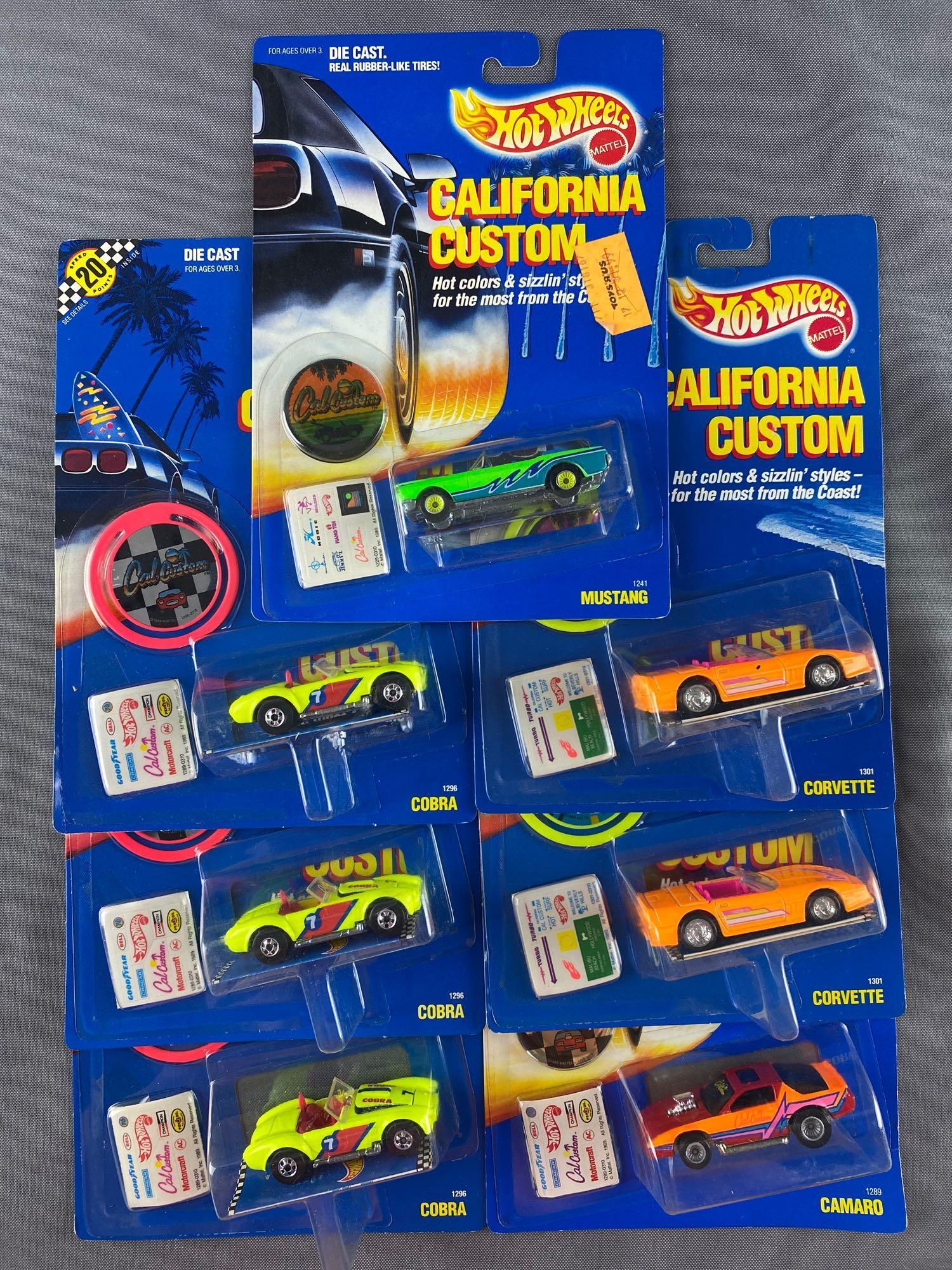 Group of 7 Hot Wheels California Customs die-cast: Includes Mustang, Cobra, Corvette, and Camaro. New in original packaging. Made in Malaysia. 1989 Mattel, Inc