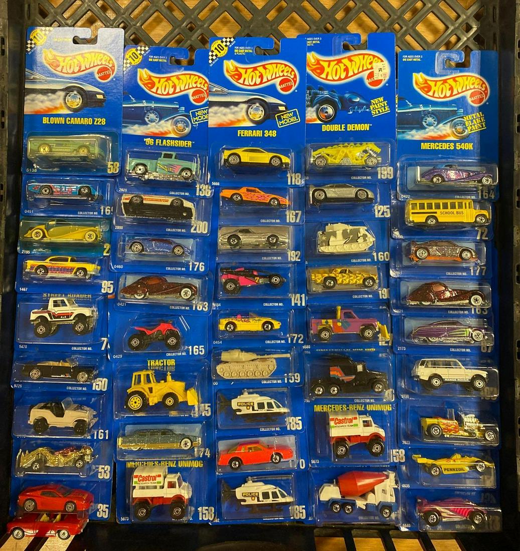 Group of appx 40 assorted Hot Wheels die-cast vehicles: Includes Limozeen, T-Bucket, Zombot, and more. New in original packaging