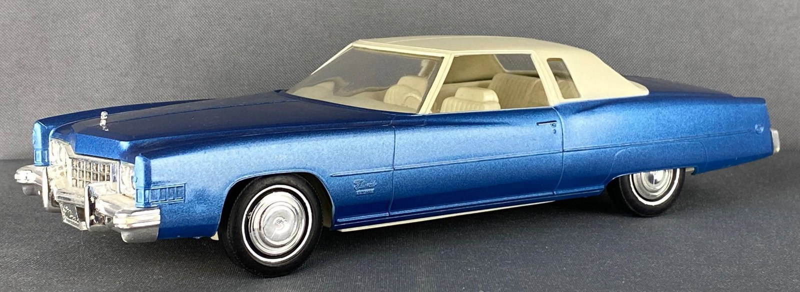 1973 Cadillac Eldorado Dealer Promo Car: Blue body, white top and interior, 8.75x3.25x2.25 inches, non-friction