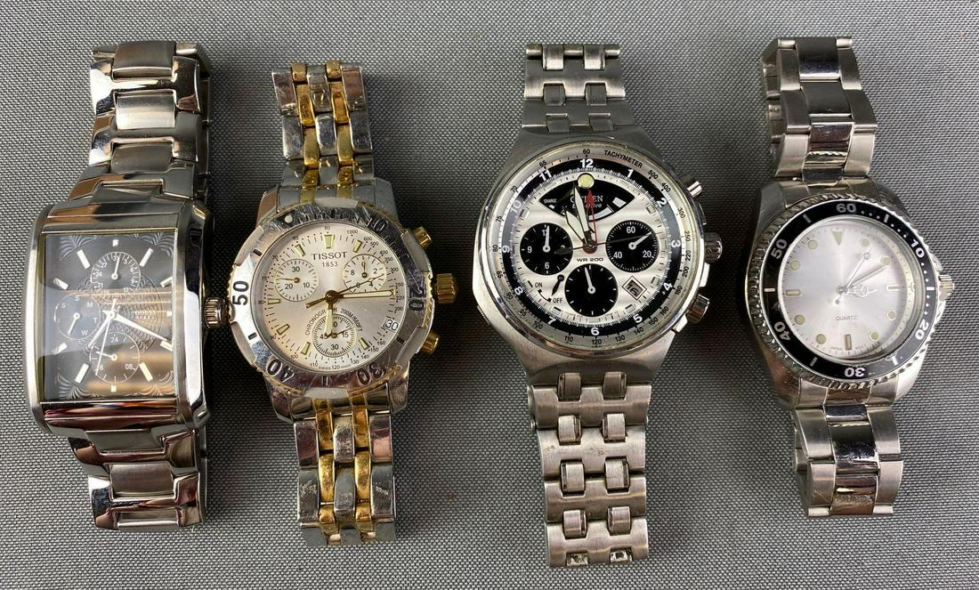 Group of 4 Watches: Includes Guess, Tissot, Citizen, and Quartz. Unknown working condition