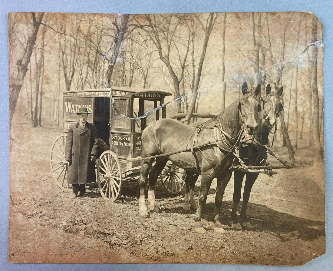 Early 20th Century Medical Carriage Photograph: Carriage is from the J R Watkins Medical Company. Measures approximately 7 1/2 x 9 3/8 inches. Photograph has been torn and taped together.