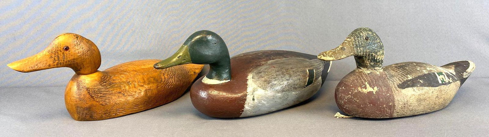 Group of 3 carved wood duck decoys (1 of 12)