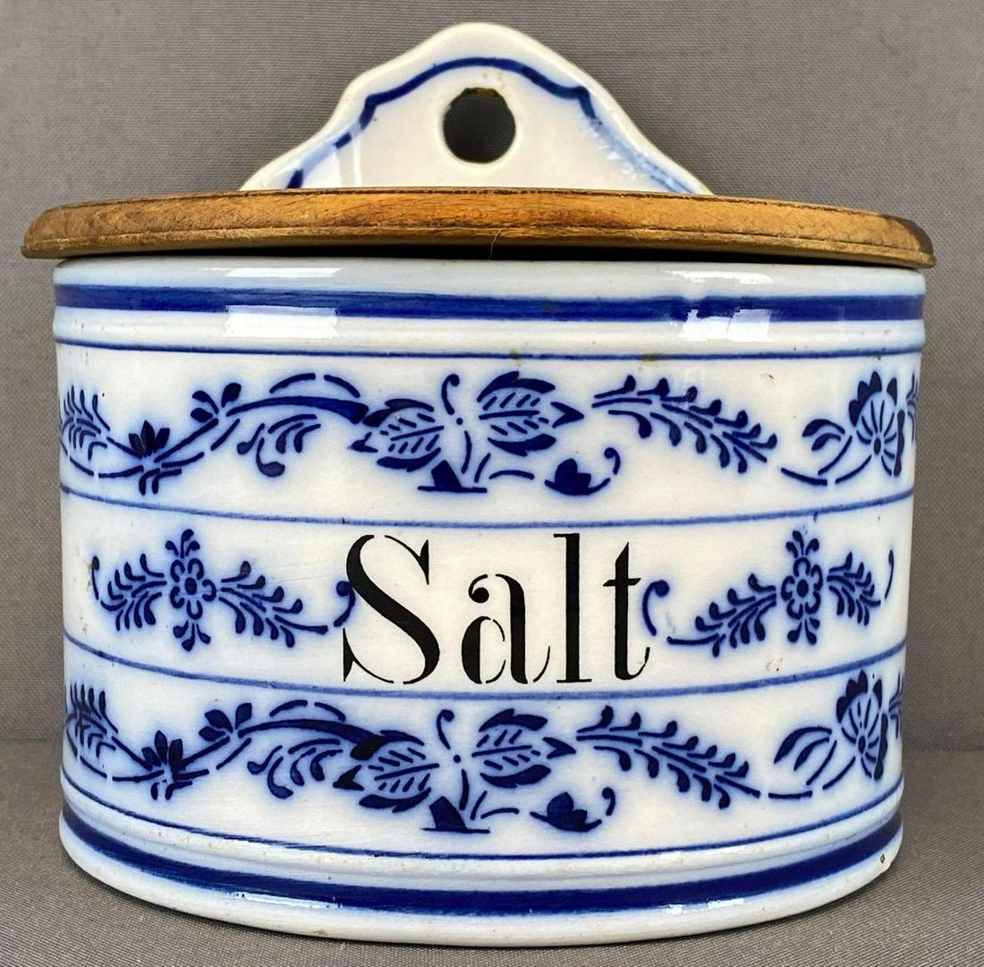 German blue and white salt box with wood lid: Hinged front of lid is no longer connected. Appx 6x5.75 inches. Germany 784 stamped on bottom