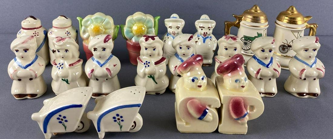 Group of 20 assorted salt and pepper shakers: Mostly Shawnee Pottery, some unidentified. Largest is 3x4.5 inches. (9) matched pairs