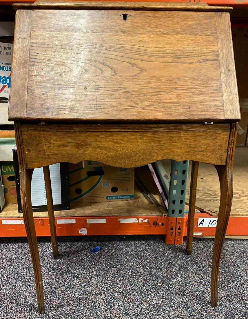 Oak Secretary Desk: Measures approximately 26 1/2 inches x 41 inches tall. No Shipping