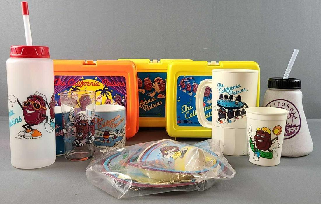 Group of California Raisin collectibles: Lunch boxes (2 have thermoses), cups, mugs