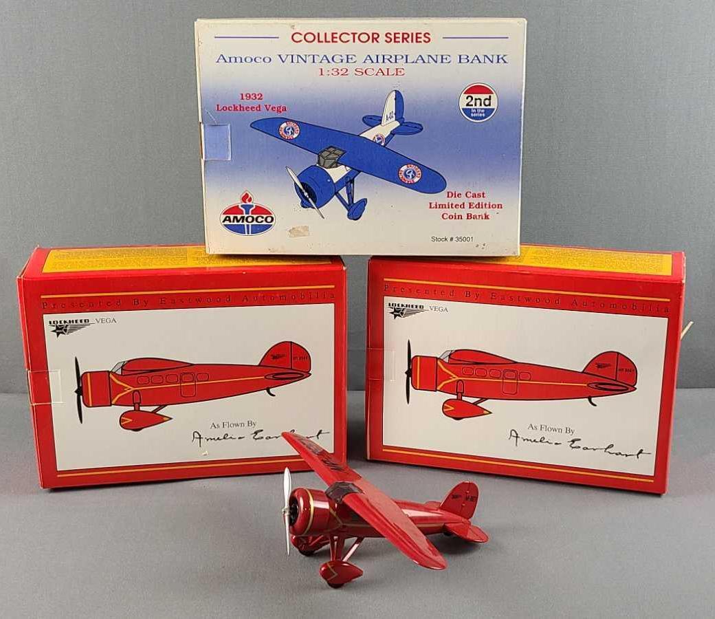 Group of 4 Lockheed Vega model airplanes: In original packaging. One Amoco bank