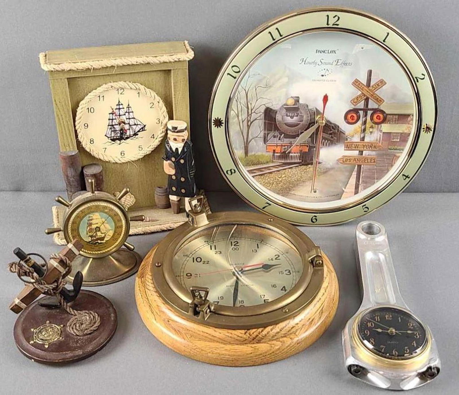 Group of 6 clocks, thermometer: Train clock with hourly sound effects, 11.5 inch diameter. Ship clock and more. All untested