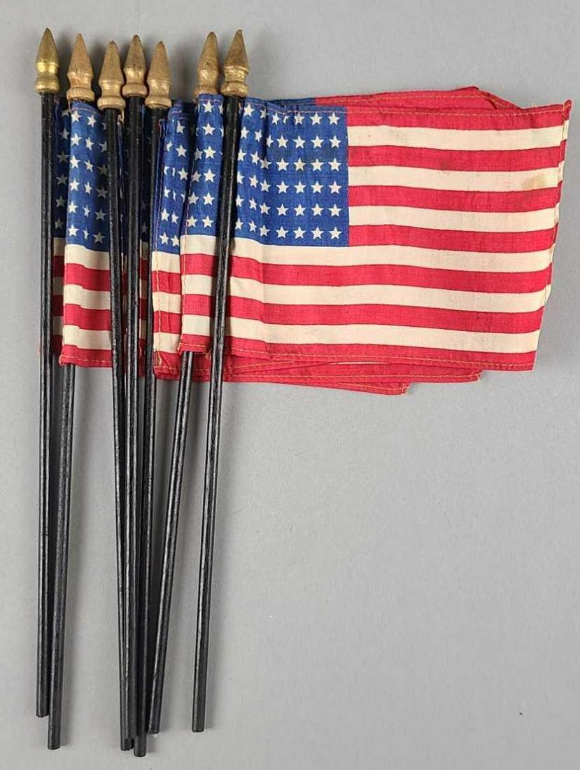 Group of 7 48 star US flags: 10.75 inches long