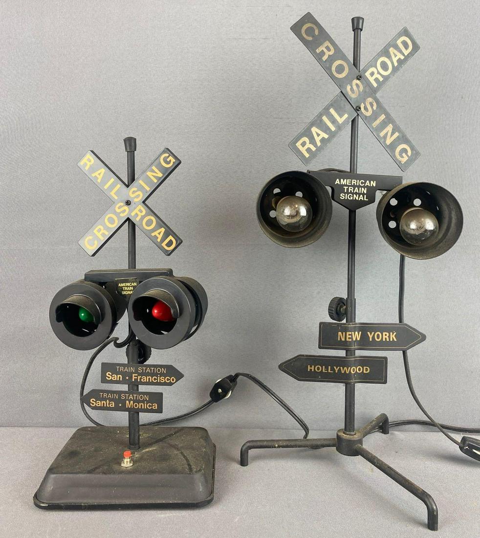 Group of 2 American Train Signal toy Railroad Crossing: Largest is 7.25x7x17.75 inches. Lights in Working condition, sound untested