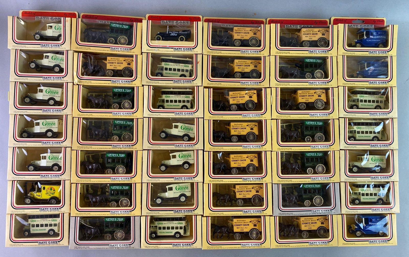 Group of 100 Lledo Days Gone Die Cast Vehicles: Includes Promotional Models, Festival Gardens bus, Wells truck, Lipton Tea wagon, and more.