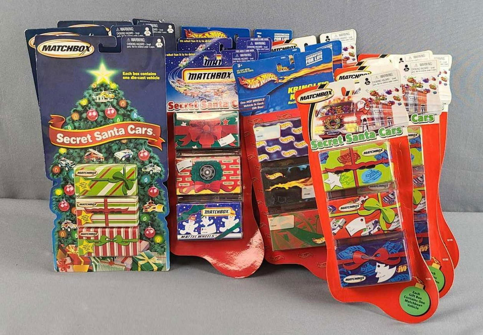 Group of 14 Christmas package die cast vehicles (1 of 3)