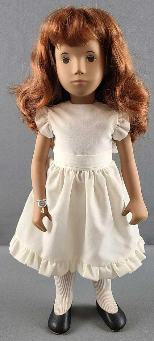 Sasha redhead with white dress doll: Includes wrist tag. 16 inches tall. Some minor rubs. #108. Joints are tight.