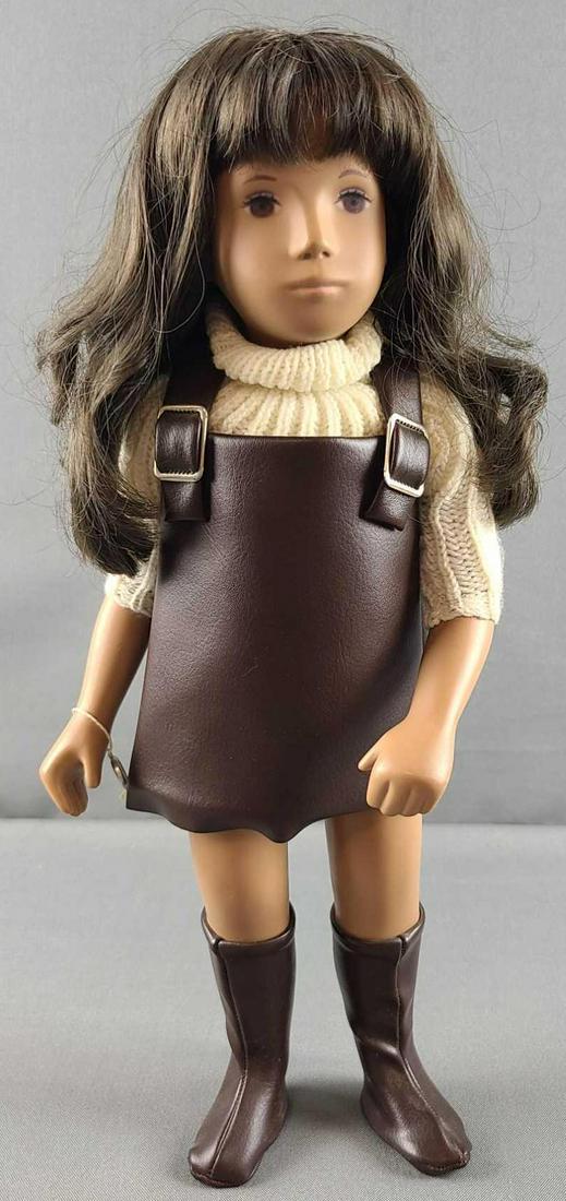 Sasha brunette doll in sweater and leather jumper: Includes wrist tag. 16 inches tall. Joints are tight. Some minor rubs.