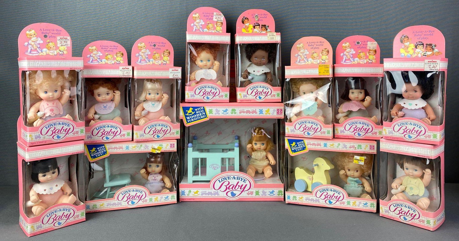 Group of 13 Hasbro Love A Bye Baby Dolls: 1987, all in original boxes