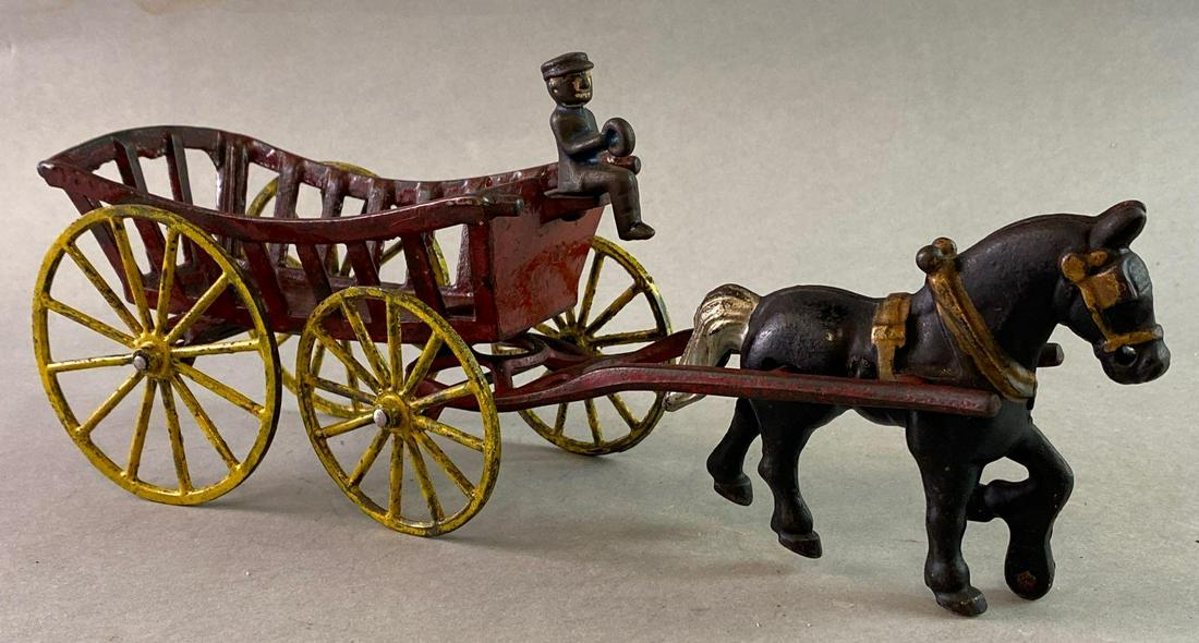 Antique Kenton Cast Iron Plantation Cart: Measures approximately 14 x 5 1/2 x 3 3/4 inches.
