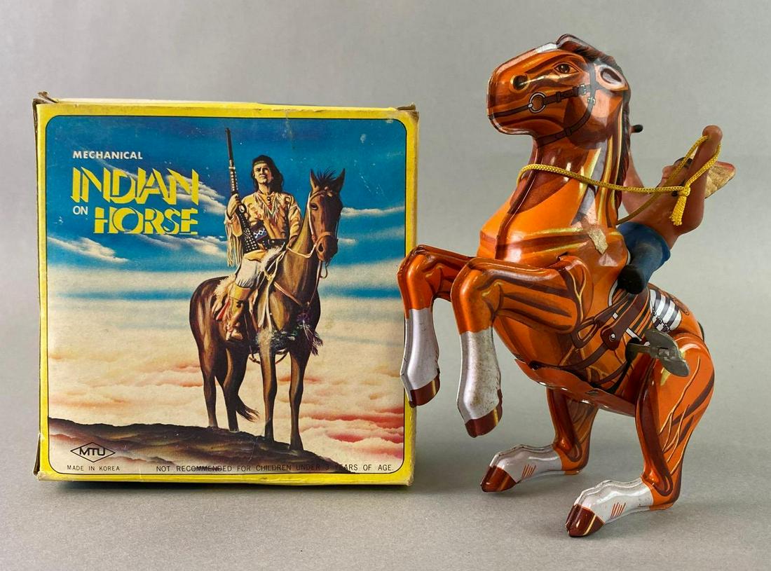 MTU Indian on Horse Wind Up Tin Toy with Box: Working. Box measures approximately 5 1/2 x 2 1/2 inches. You measures approximately 5 1/2 inches tall.