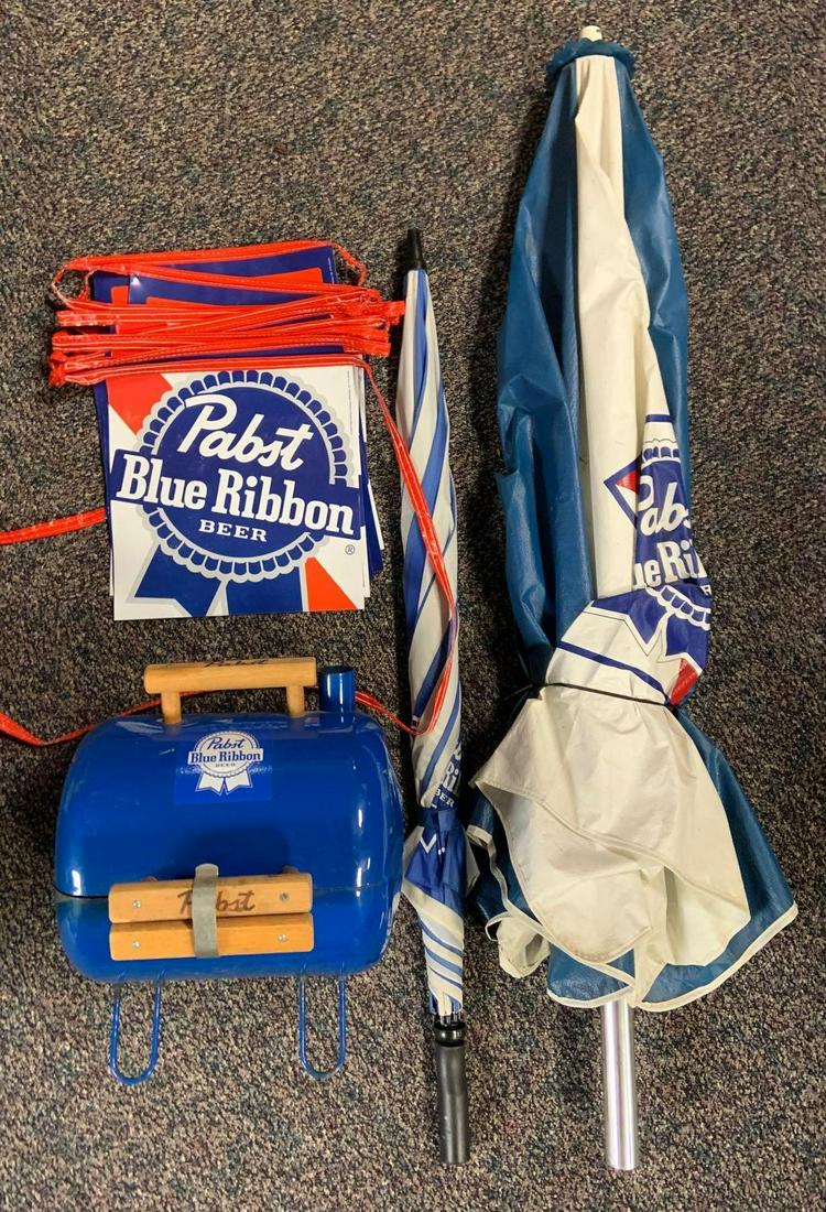 Group of 4 Pabst Blue Ribbon Advertising Items: Includes 2 Umbrellas, Grill, and Banners. Grill has rust, Largest Umbrella 50 inches tall