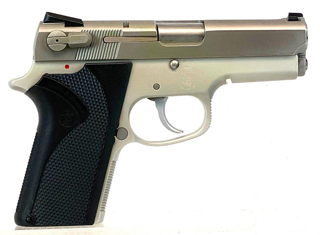 Smith and Wesson Model 3913 9mm Semi Auto Pistol: Serial number TEB3112. Includes 3 magazines, Galco Leather Holster, and Extra Walnut Grips.