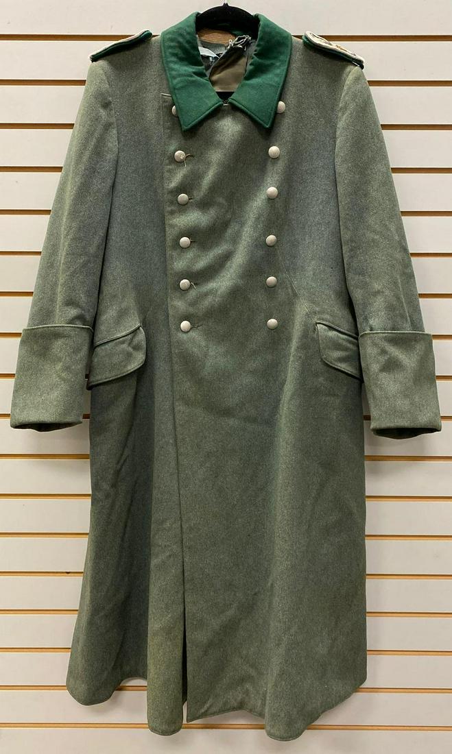 WW2 German HV Administration Overcoat: Shoulder boards have the HV for Army Administration. Has some staining and moth holes.