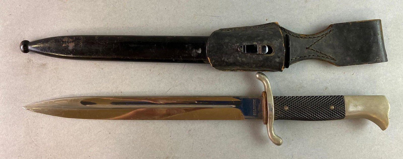 WW2 German Dress Bayonet: Marked Solingen. Overall length is 14 1/2 inches. Blade length is 9 1/2 inches.