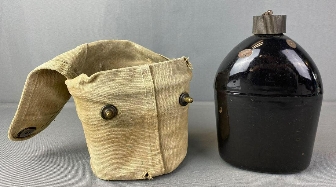WW2 USMC Flap Canteen Cover with Rare Canteen: Has rare Porcelain covered canteen. Measures 6X4.5X7.5 inches.