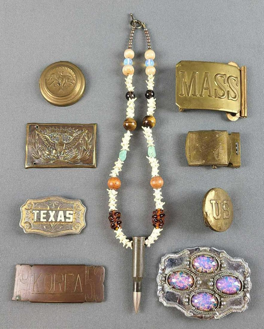 Group of belt buckles and vertebrae necklace: 1953 Korea, Texas, and more