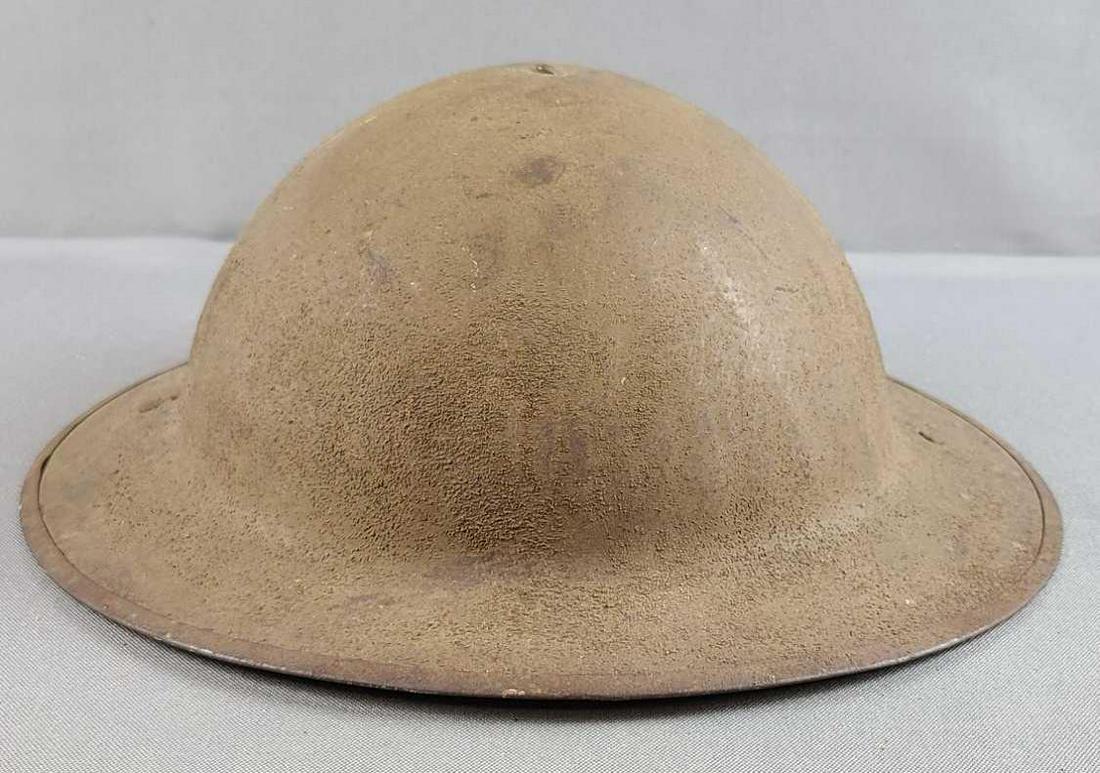 WW1 British Helmet: Very nice liner, unbroken chin strap. Manufacturer mark of HS 168. Manufactured by Hadfield Ltd of Sheffield.