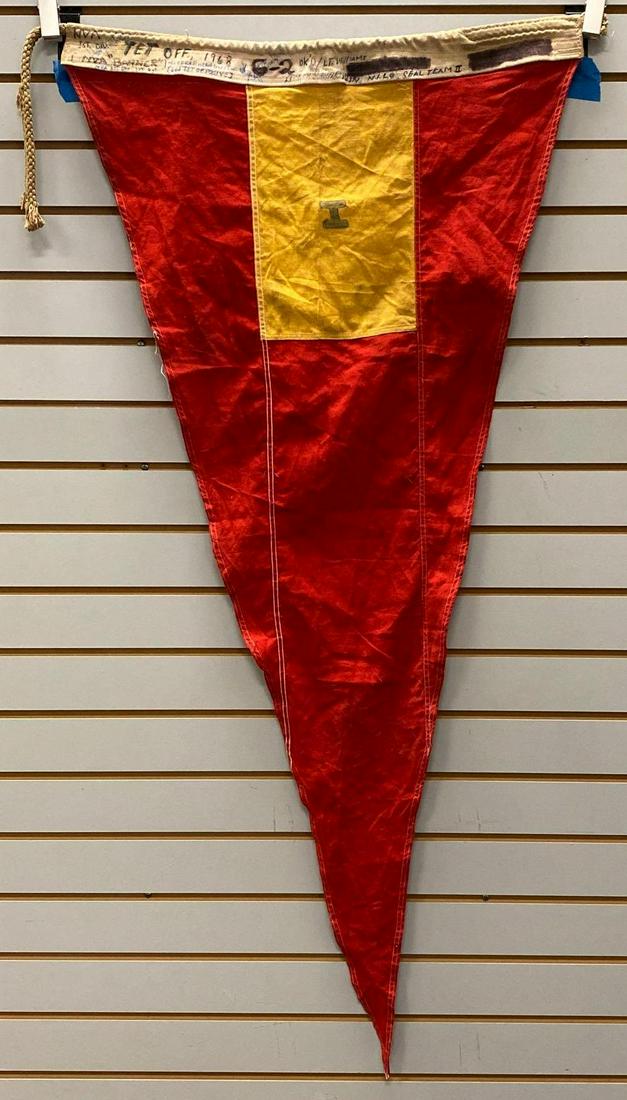 Vietnam War NVA Flag: Captured during the TET offensive and signed by the men who captured it. Measures 49 x 24 inches.