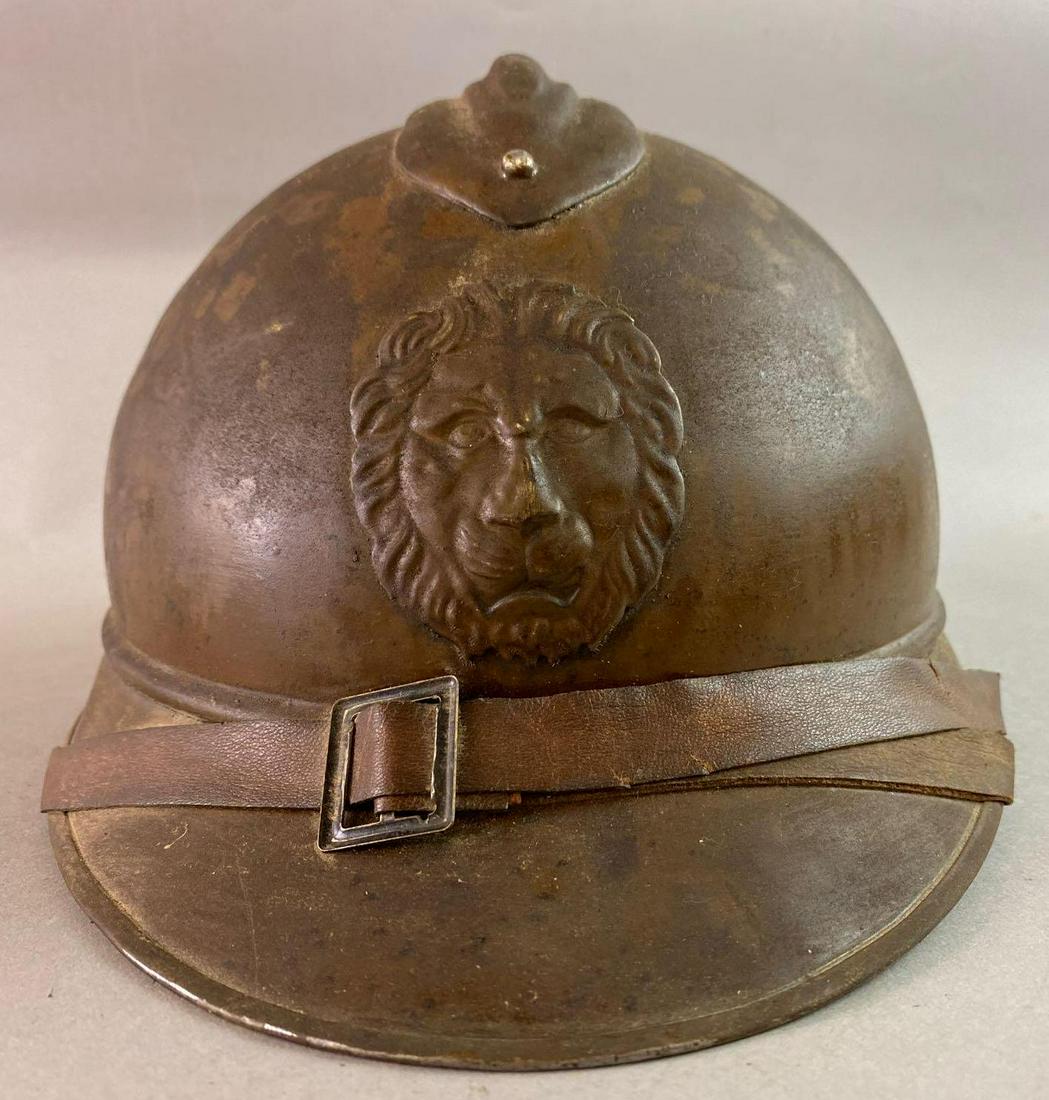WW1 Belgian M15 Adrian Helmet: French Shell with Belgian Badge. The liner is a reproduction.